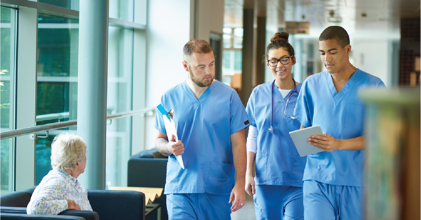 Managing challenges of healthcare staffing shortages - A group of healthcare professionals conducting rounds on their patients.