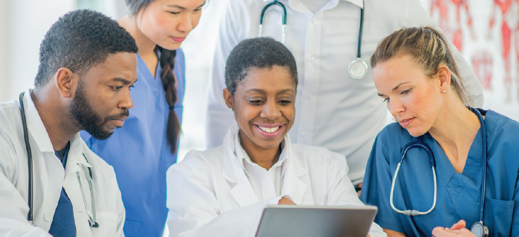 Team of doctors in a hospital training for patient data protection.