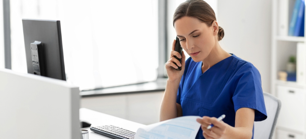 Broken billing experience - A female medical staff member calling patients regarding their medical bills.